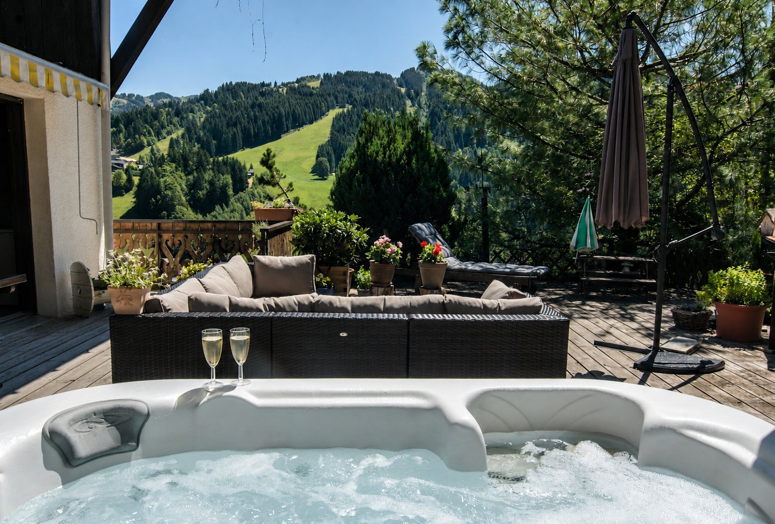 Hot tub with champagne and mountain views