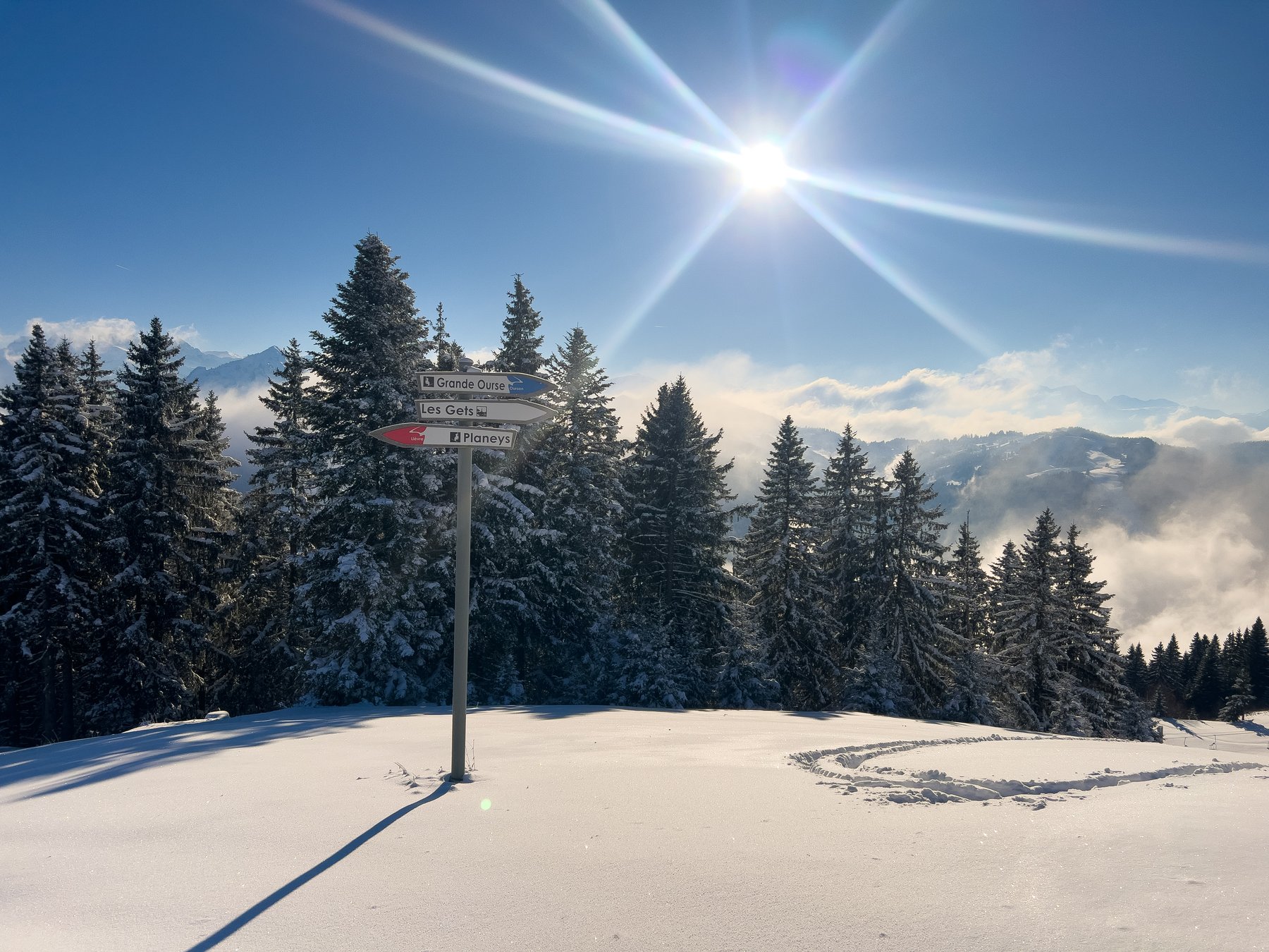 Les Gets piste signs in winter