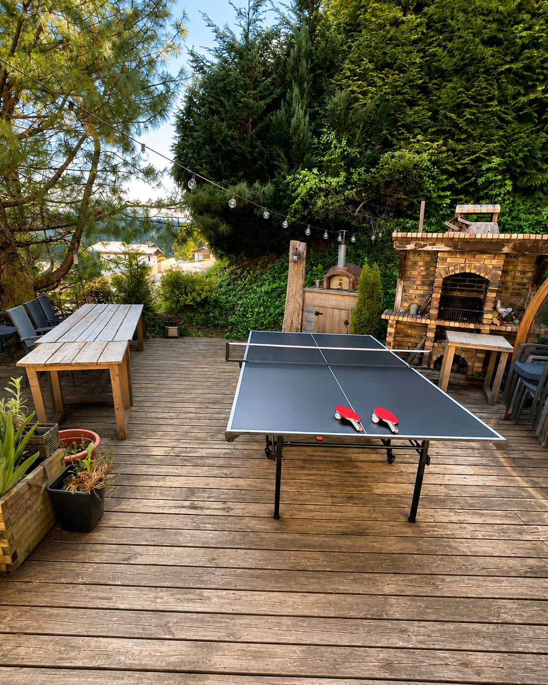 Terrace with table tennis and pizza oven